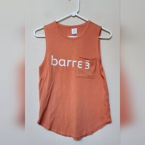 Pure Barre Muscle Tee in Coral Orange with White Logo.  Size Small